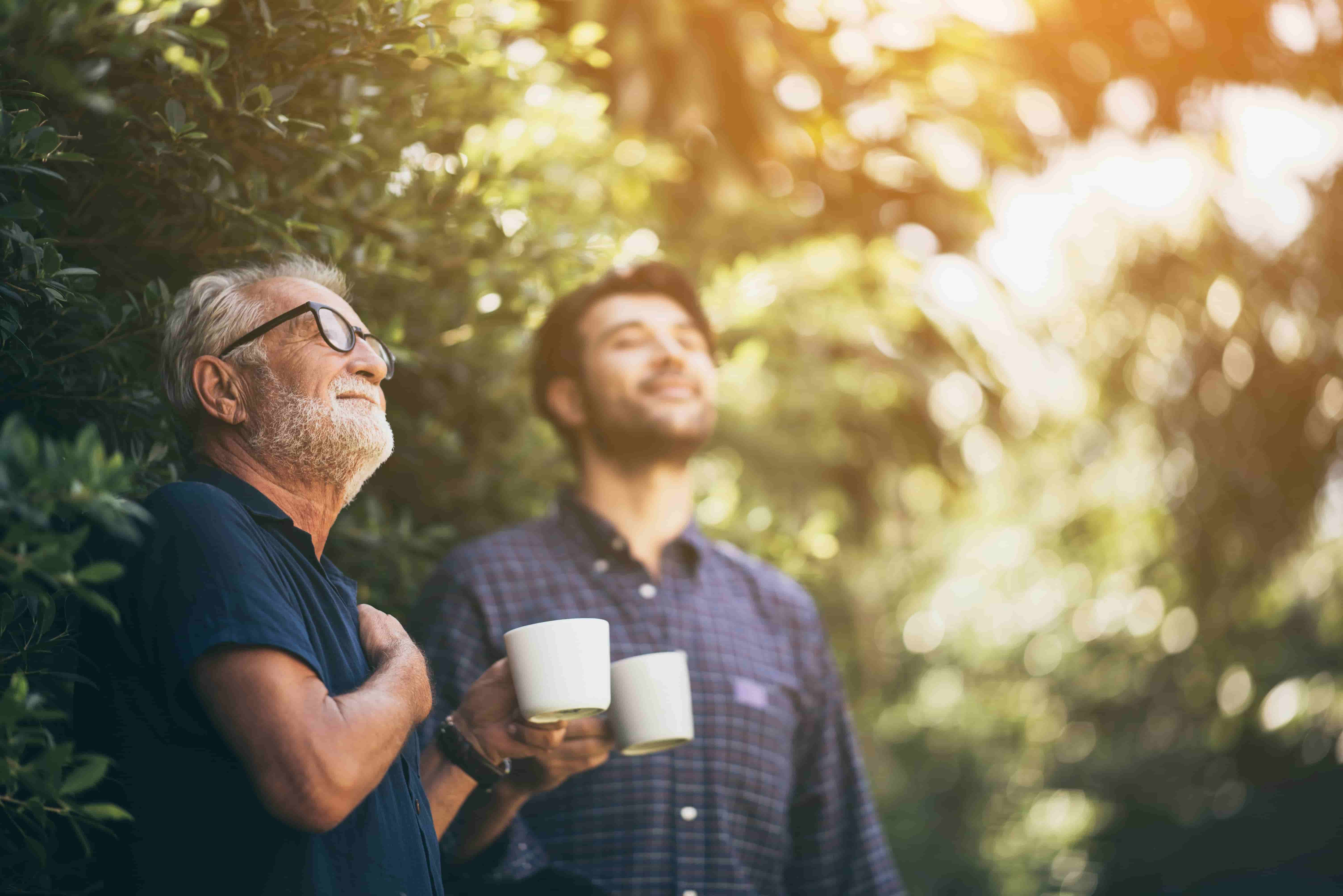 Father and son drinking coffee